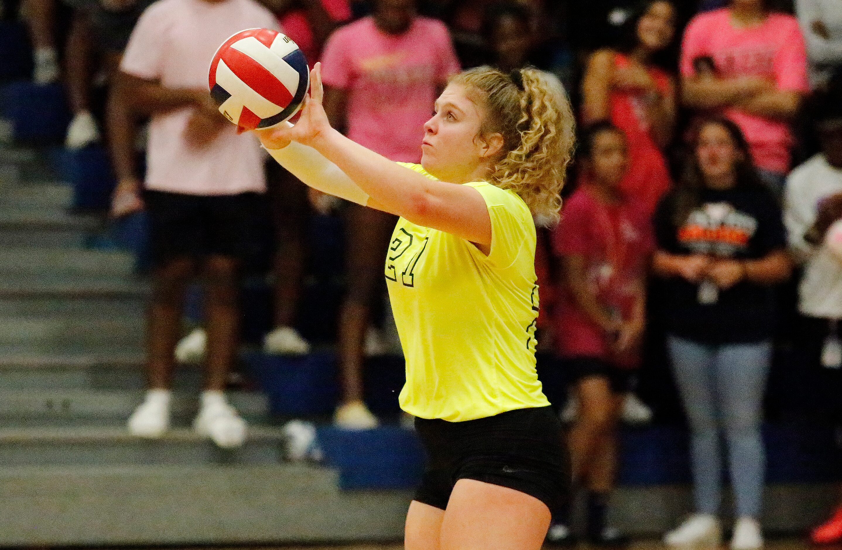 Wylie High School libber Niki Perry (27) passes a serve during game two as Sachse High...