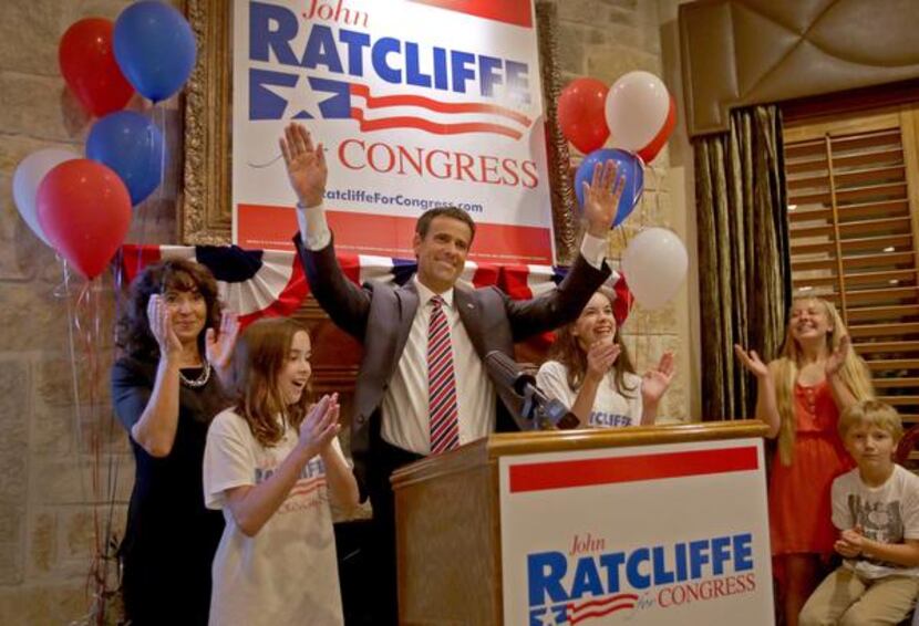 
John Ratcliffe celebrated his GOP primary runoff victory Tuesday night along with his wife,...