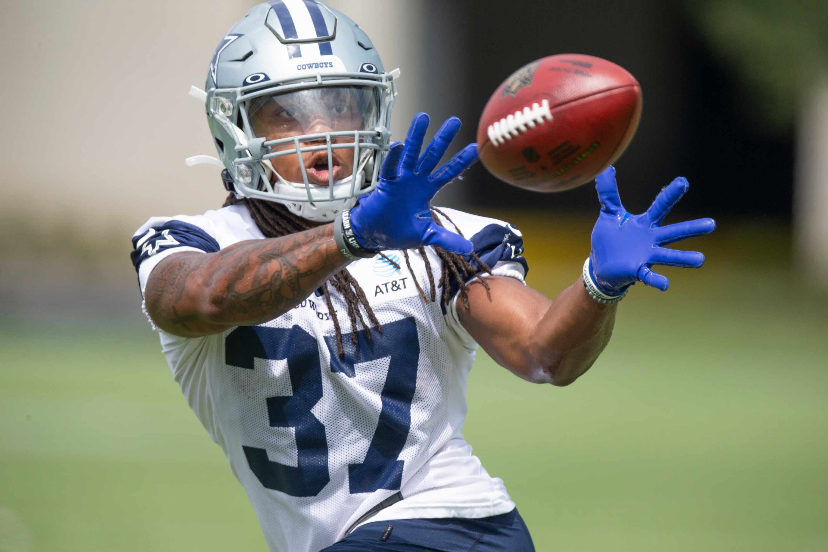 Dallas Cowboys practice squad running back JaQuan Hardy catches a pass during practice at...