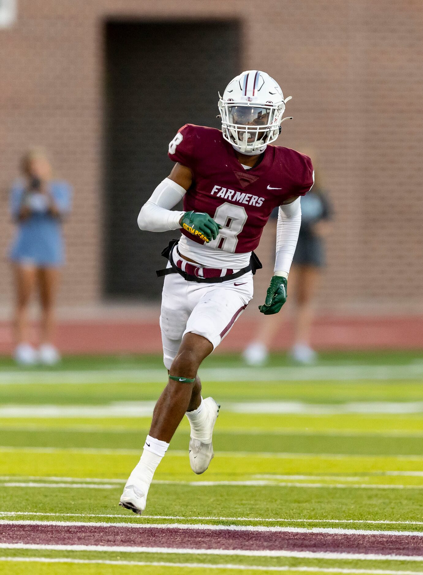 Lewisville senior defensive back Caden Jenkins (8) defends on a kick return during the first...