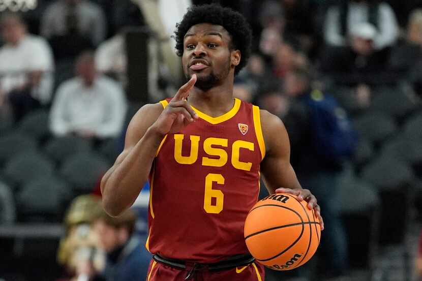 Southern California's Bronny James (6) brings the ball up the court during the first half of...