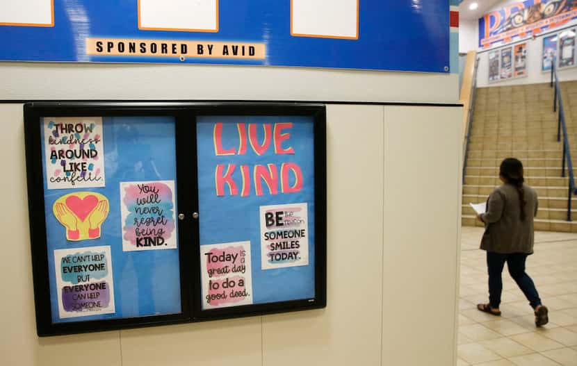 Signs give examples of how to be kind at Scott Johnson Middle School in McKinney.