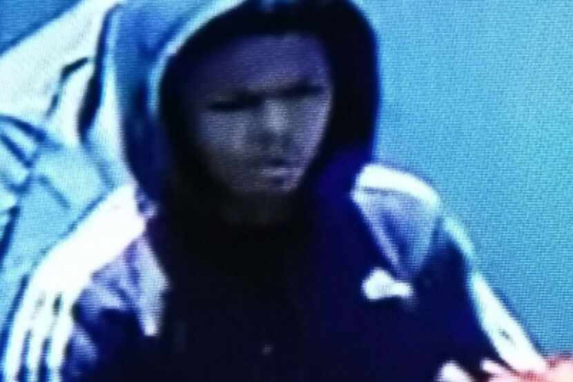A security camera image of a burglary suspect. 