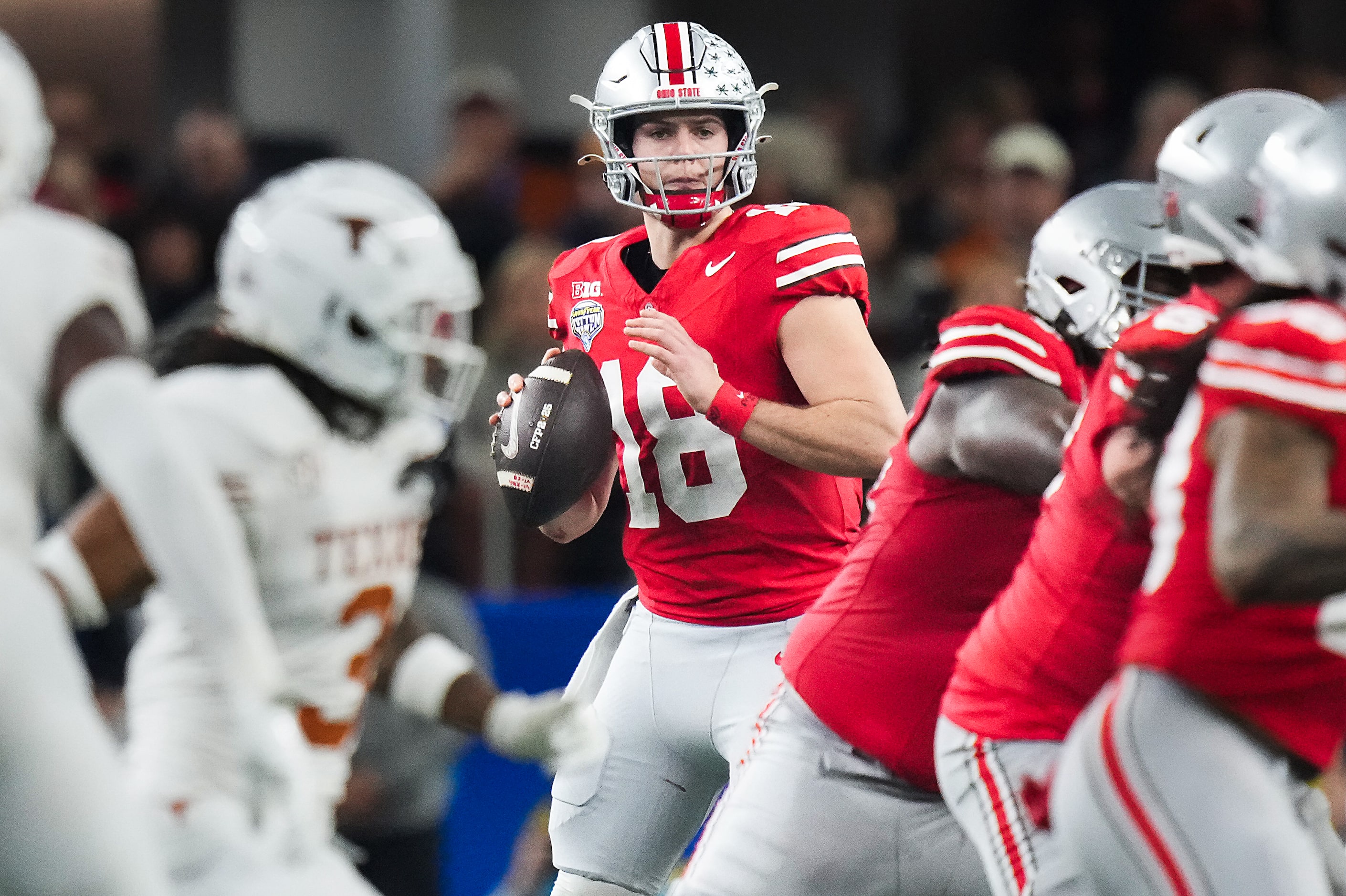 Ohio State quarterback Will Howard (18) throws a pass during the first half of the Cotton...