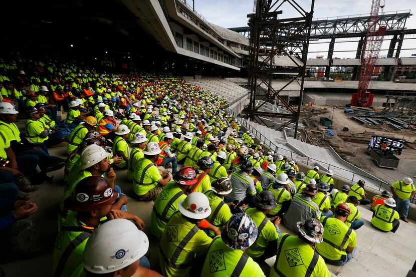 Construction workers building the new Rangers' Globe Life Field gathered to hear from...