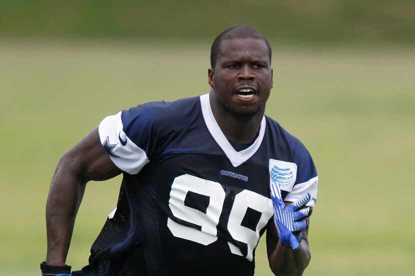 Defensive end Anthony Hargrove (99) runs sprints during Dallas Cowboys OTA's at Valley Ranch...