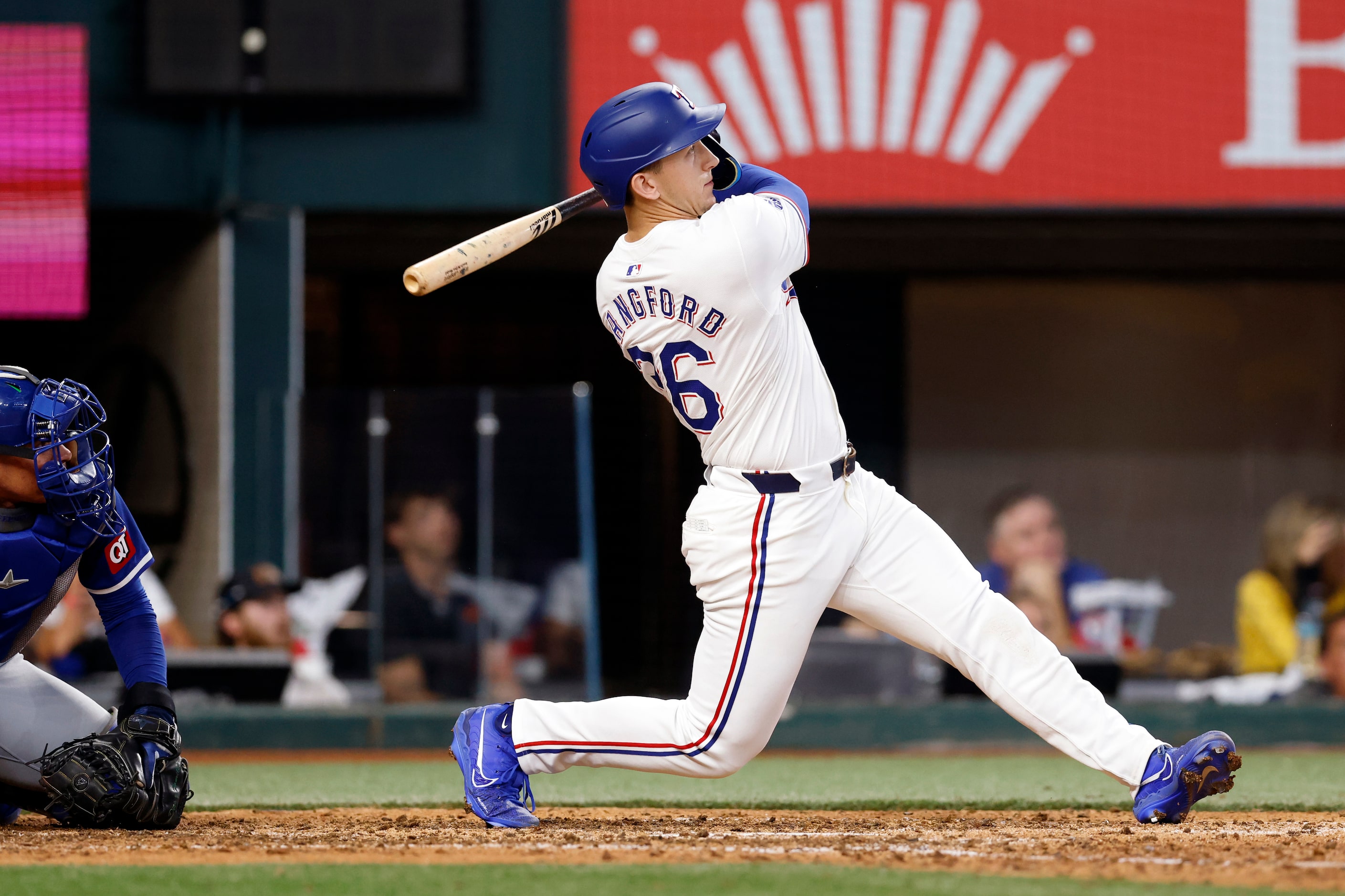 Texas Rangers left fielder Wyatt Langford (36) hits his first career grand slam off Kansas...