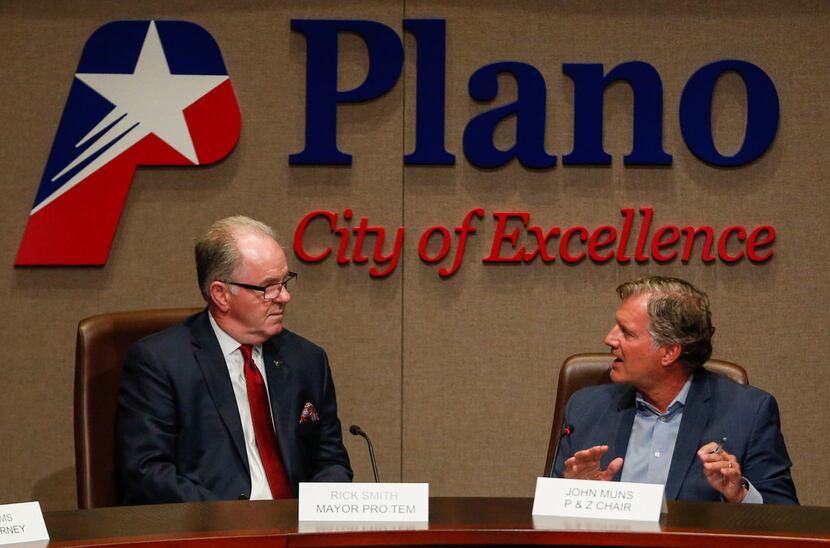 Plano Mayor Pro Tem Rick Smith (left) listened Monday night as Planning and Zoning...