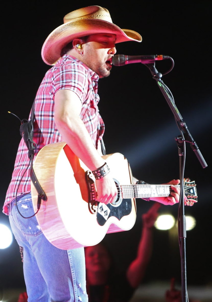 Jason Aldean performs live at the 2014 NCAA March Madness Music Festival during the NCAA...