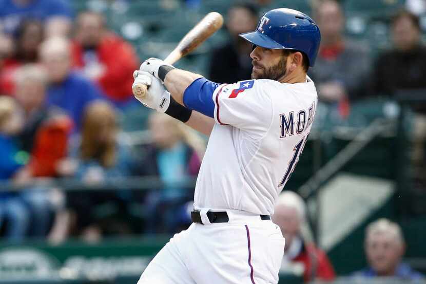 Apr 14, 2015; Arlington, TX, USA; Texas Rangers designated hitter Mitch Moreland (18)...