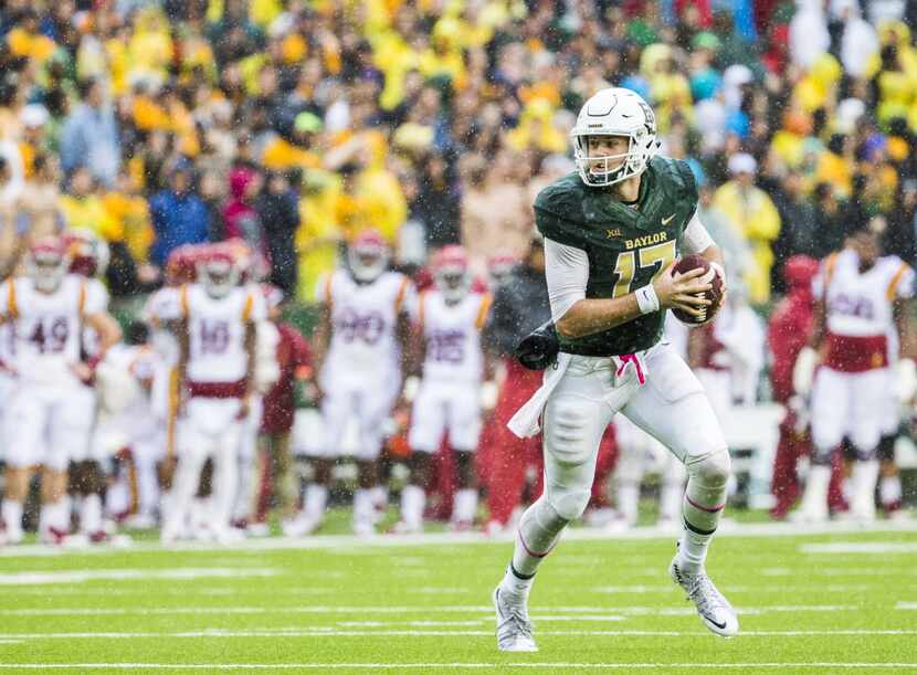 Baylor Bears quarterback Seth Russell (17) runs the ball during the first quarter of their...