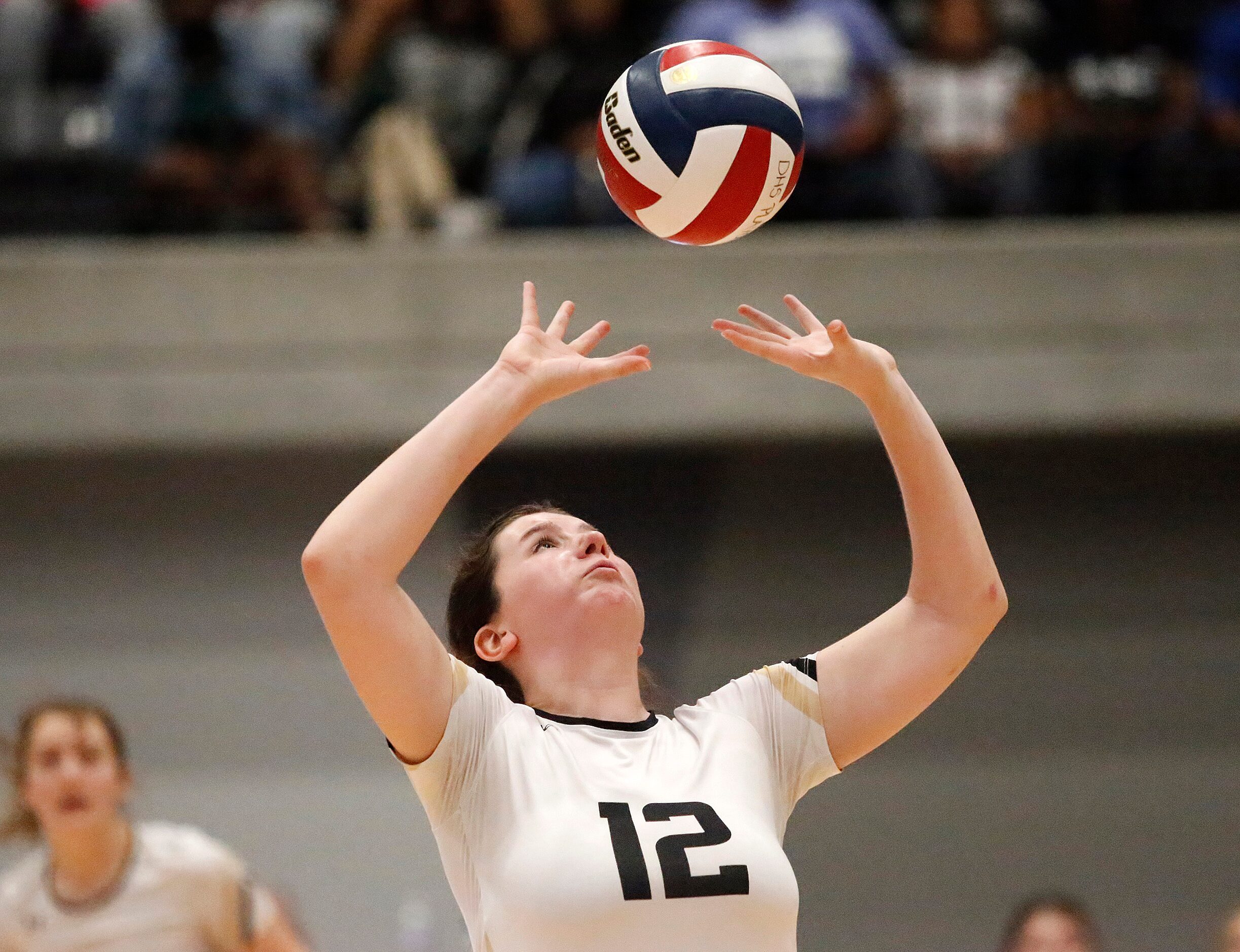 Mansfield High School setter Rachel Resta (12) makes a set during game three as DeSoto High...