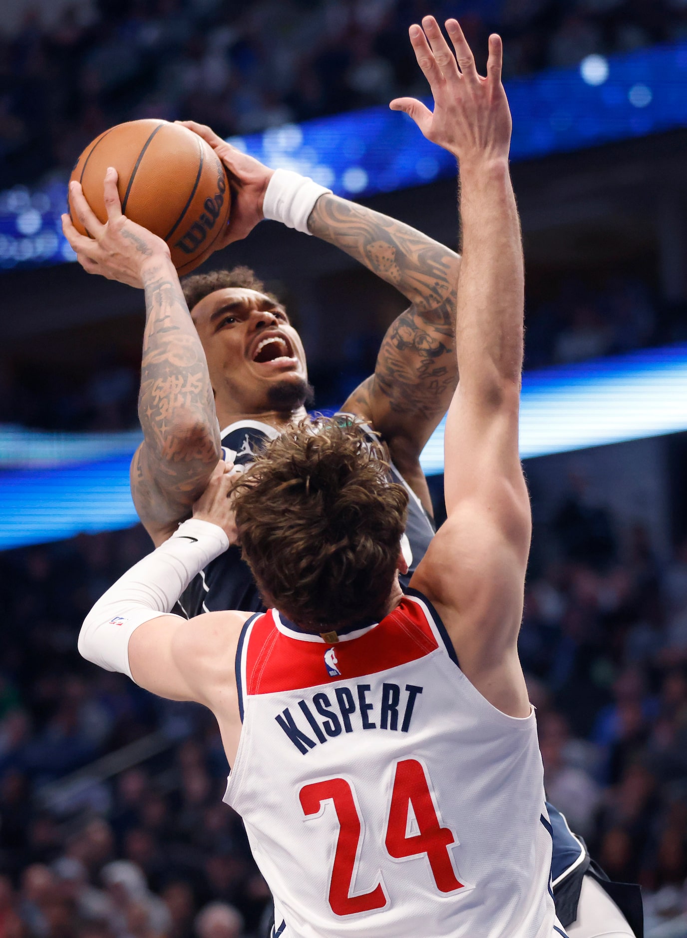 Dallas Mavericks forward P.J. Washington (25) puts up a hot ver Washington Wizards forward...