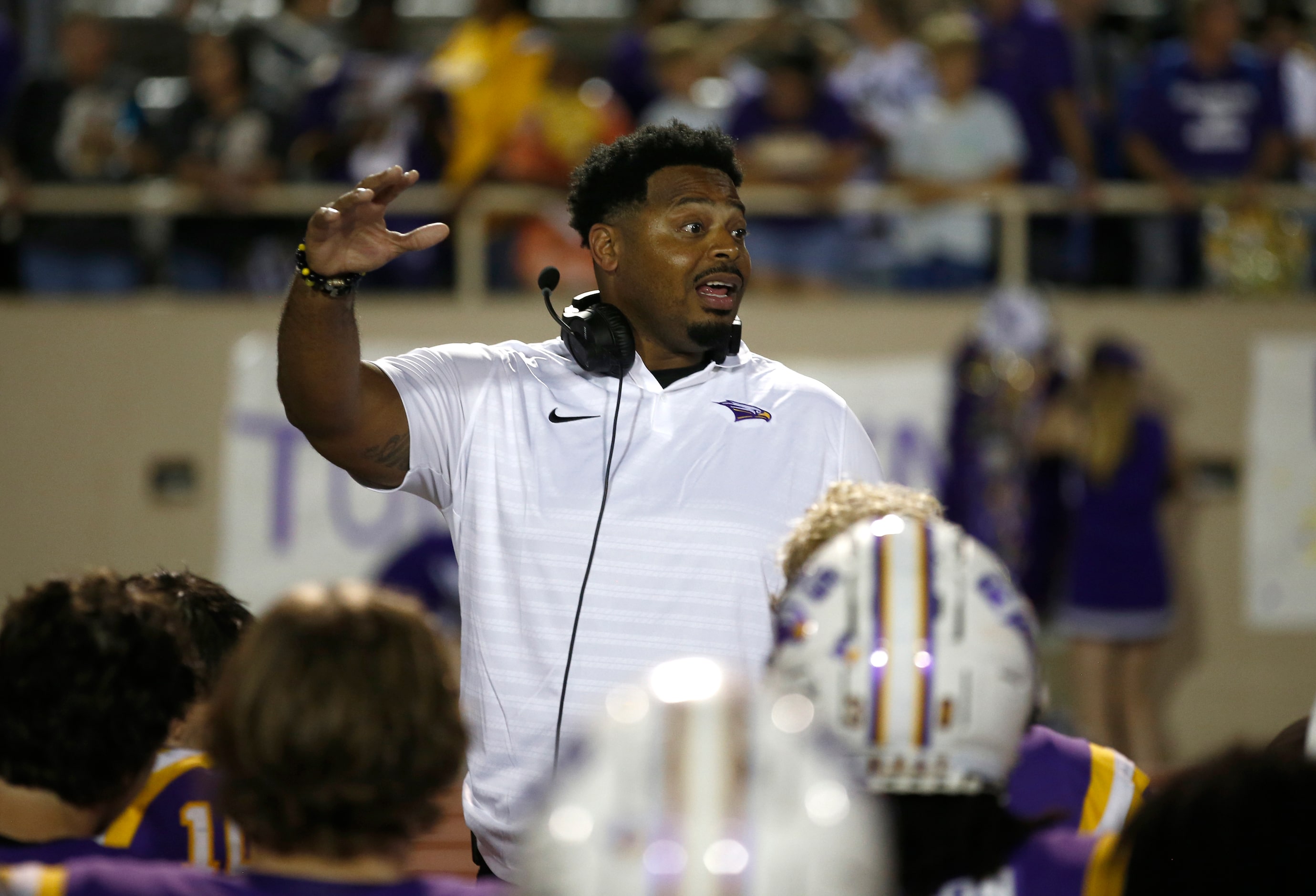 Richardson head coach Kendrick Holloway talks to his team after falling to Jesuit in a...