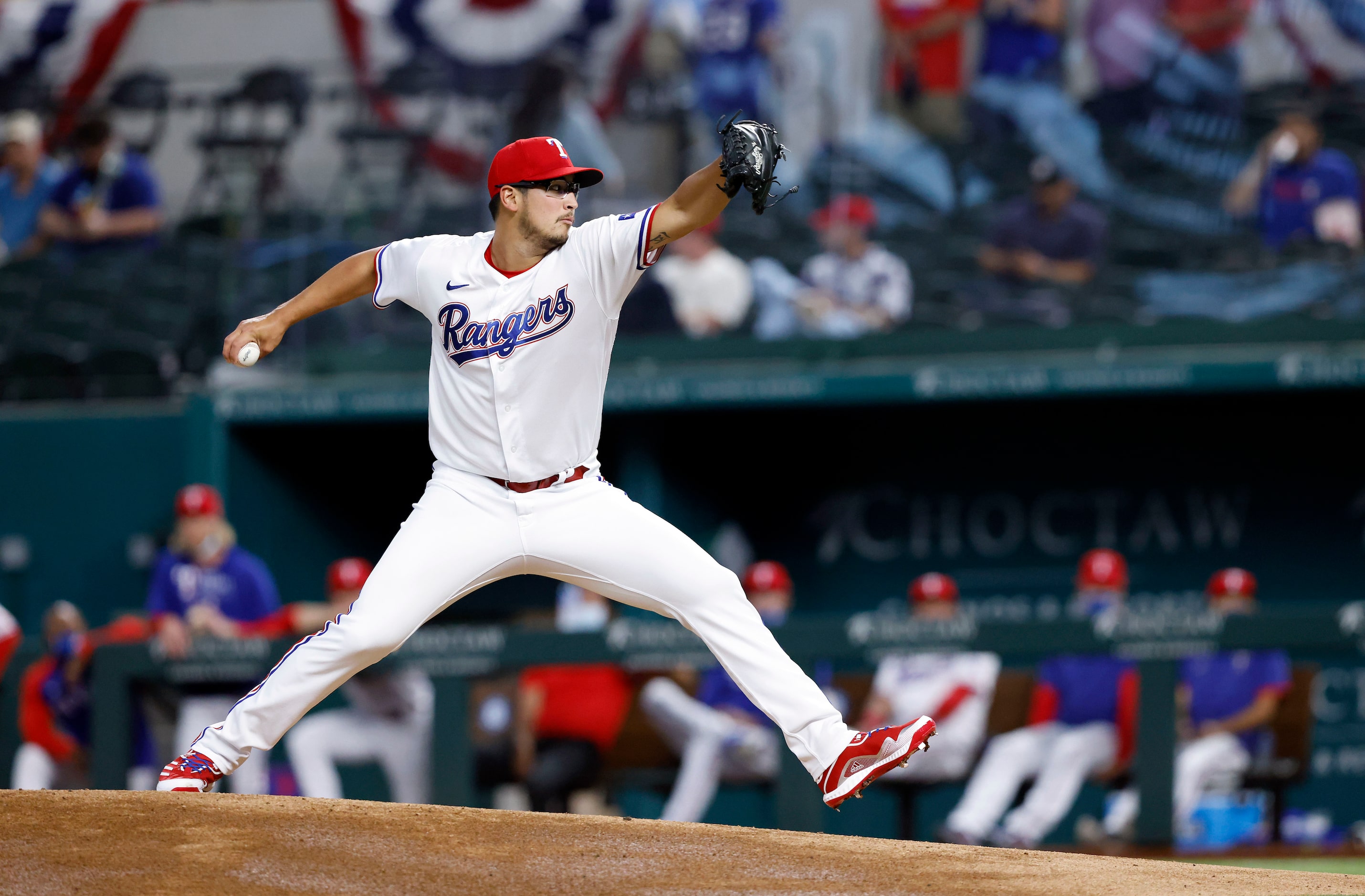 Texas Rangers starting pitcher Dane Dunning (33) throws against the Toronto Blue Jays during...