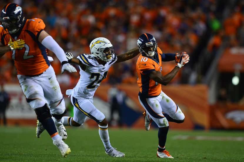 DENVER, CO - SEPTEMBER 11:  Wide receiver Emmanuel Sanders #10 of the Denver Broncos is...
