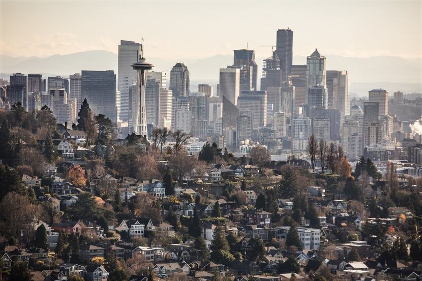 Homes in Seattle's Queen Anne neighborhood with downtown in the distance. (Steve...