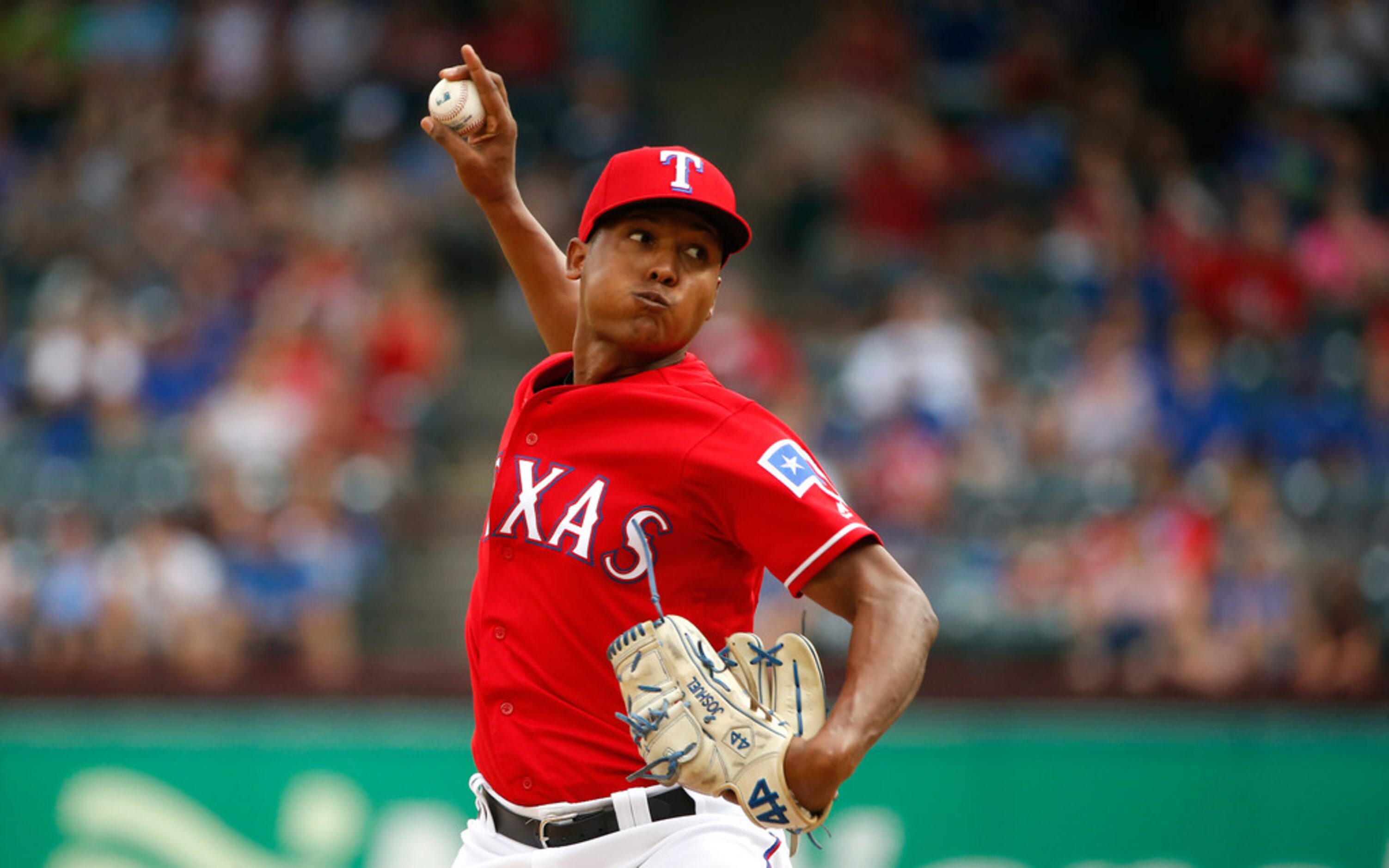 ARLINGTON, TX - AUGUST 19: Jose Leclerc #62 of the Texas Rangers throws against the Los...