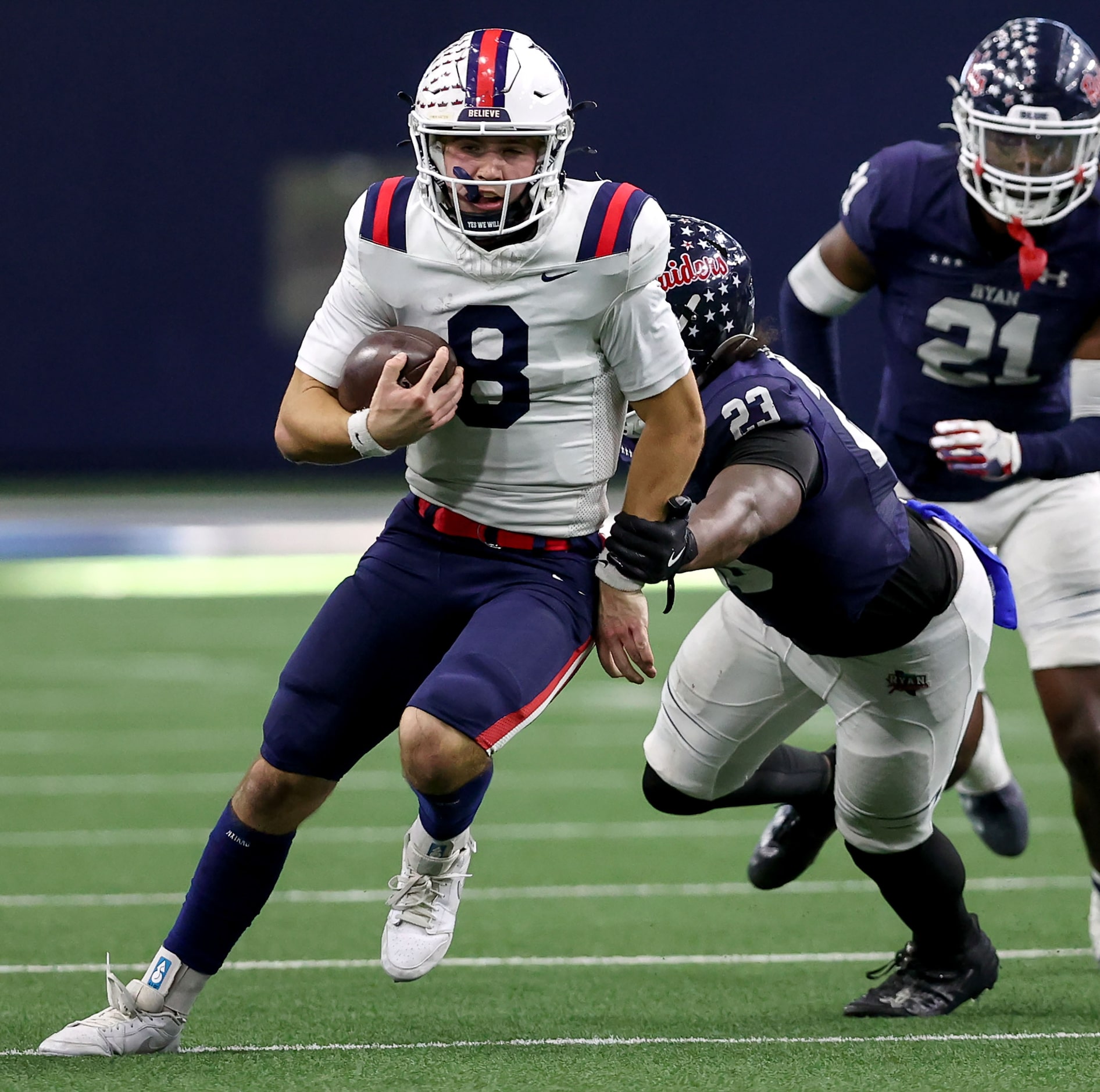 Richland quarterback Drew Kates (8) scrambles away from Denton Ryan linebacker Aston Choice...