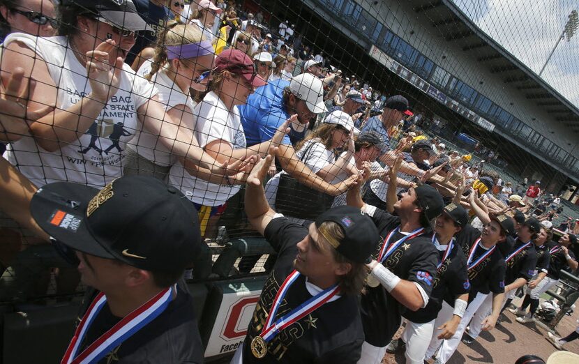 Dallas Jesuit baseball team celebrates defeating San Antonio Johnson 6-2 during the UIL...