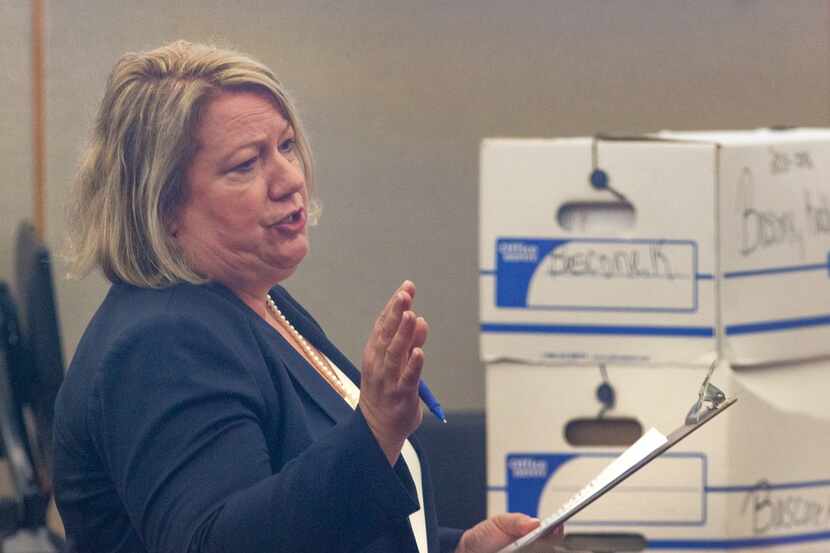 Defense lawyer Lynn Cox gives closing arguments for her client, George Guo, during Guo's...