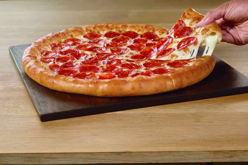 A Pizza Hut franchise operator is closing 25% of its stores.