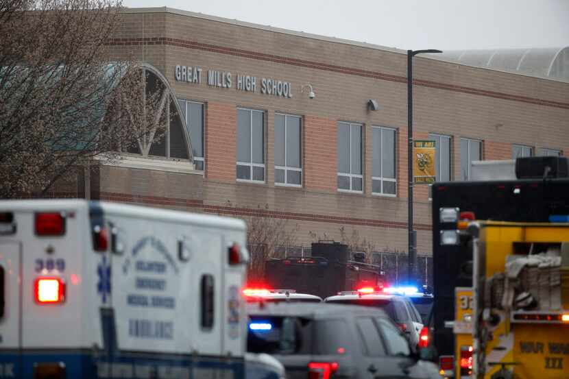 Deputies, federal agents and rescue personnel, converge on Great Mills High School, the...