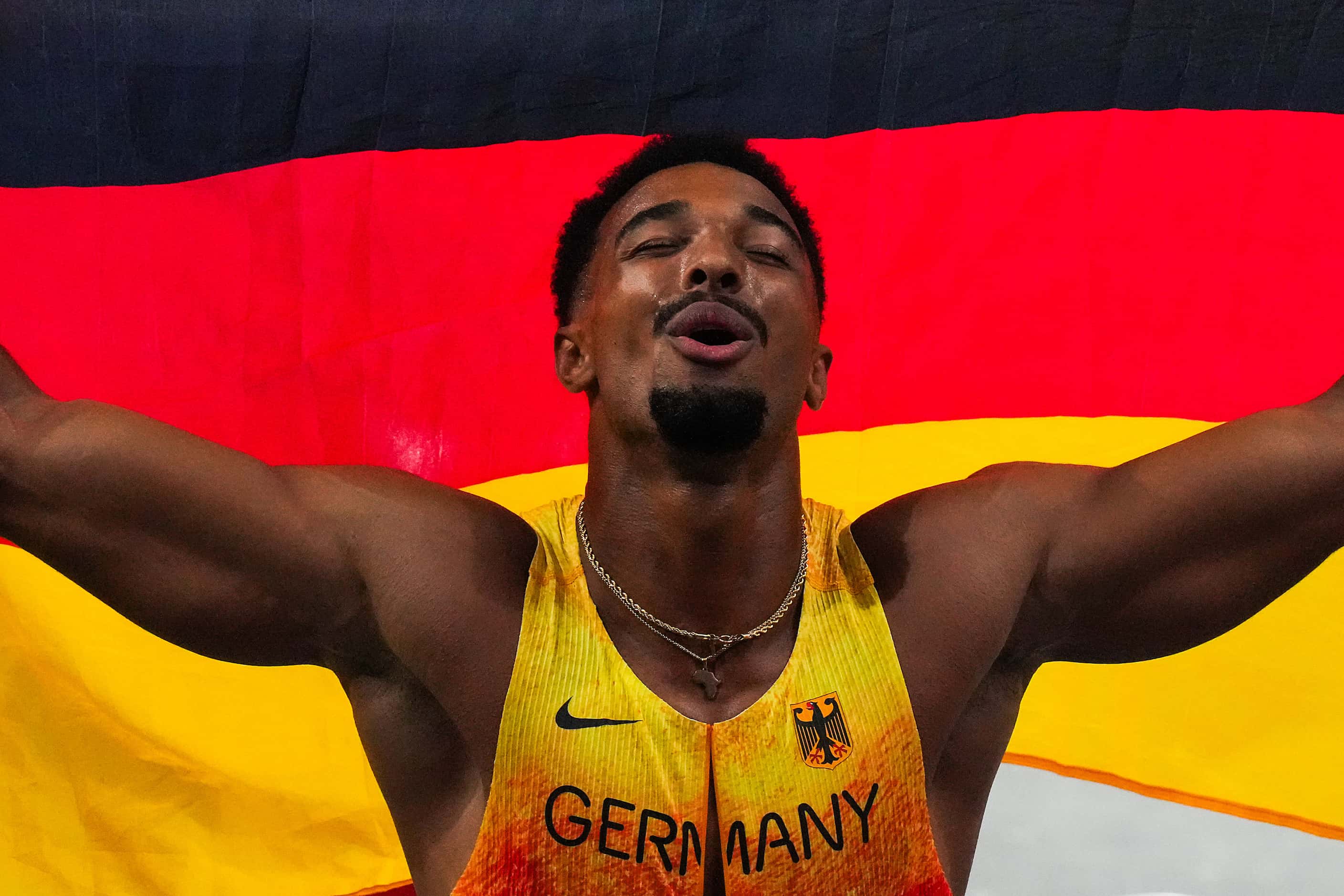 Silver medalist Leo Neugebauer of Germany celebrates after the men’s decathlon 1500-meter...