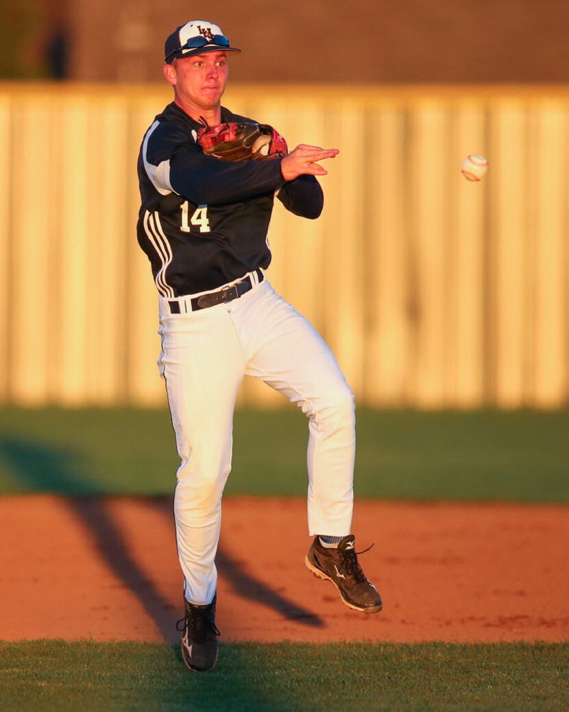 Shane Buechele playing baseball