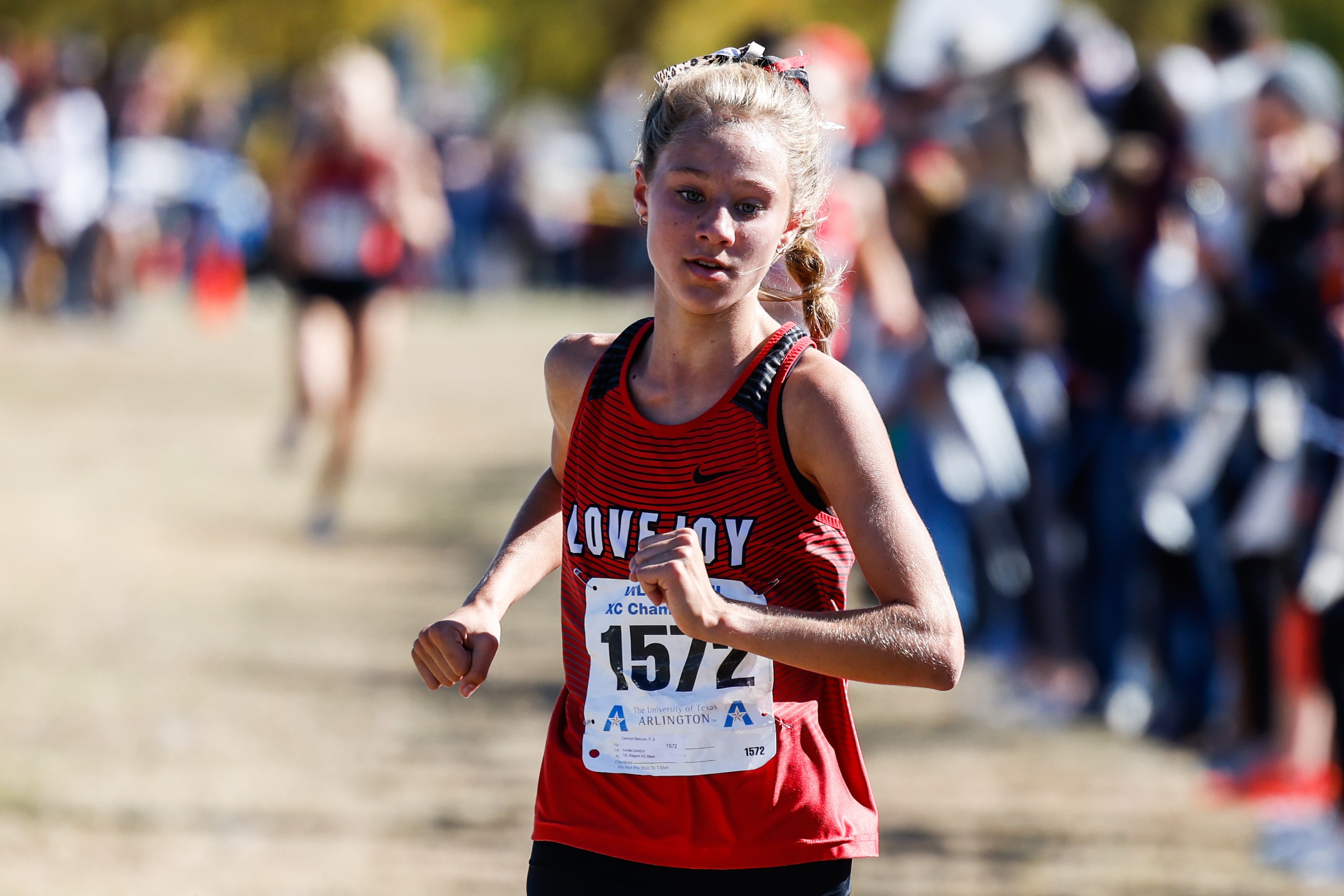 Camryn Benson (1572) from Lucas Lovejoy team approaches the finish line fourth during the...