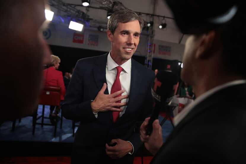 Former Texas congressman Beto O'Rourke talks to the news media after the Democratic...