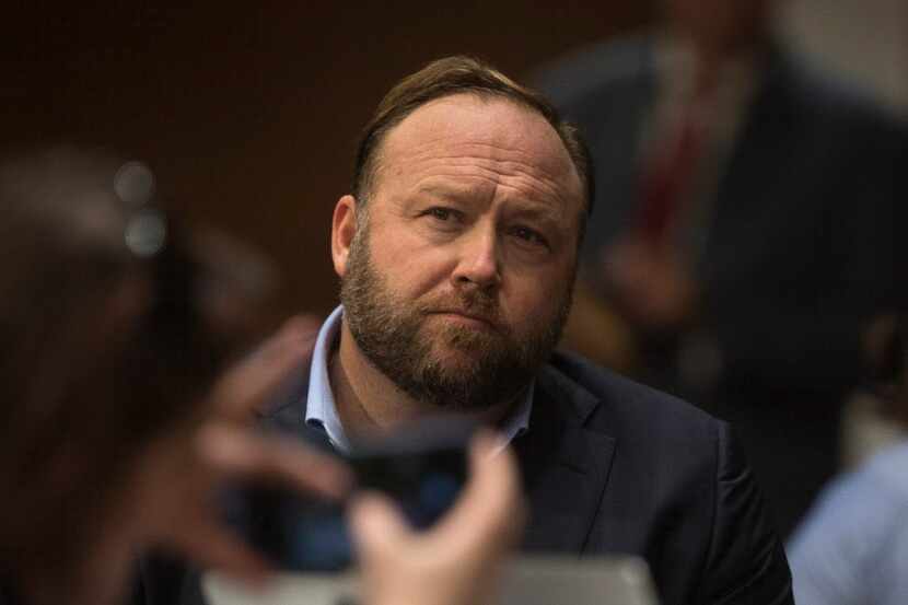 Alex Jones, the right-wing conspiracy theorist and talk show host, looked on as the leaders...