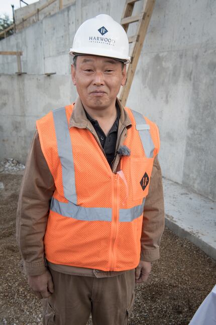 Suminori Awata is a Japanese stone mason working on the project.