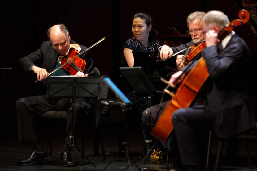 Chamber Music International features pianist Joyce Yang (center) performing with the...