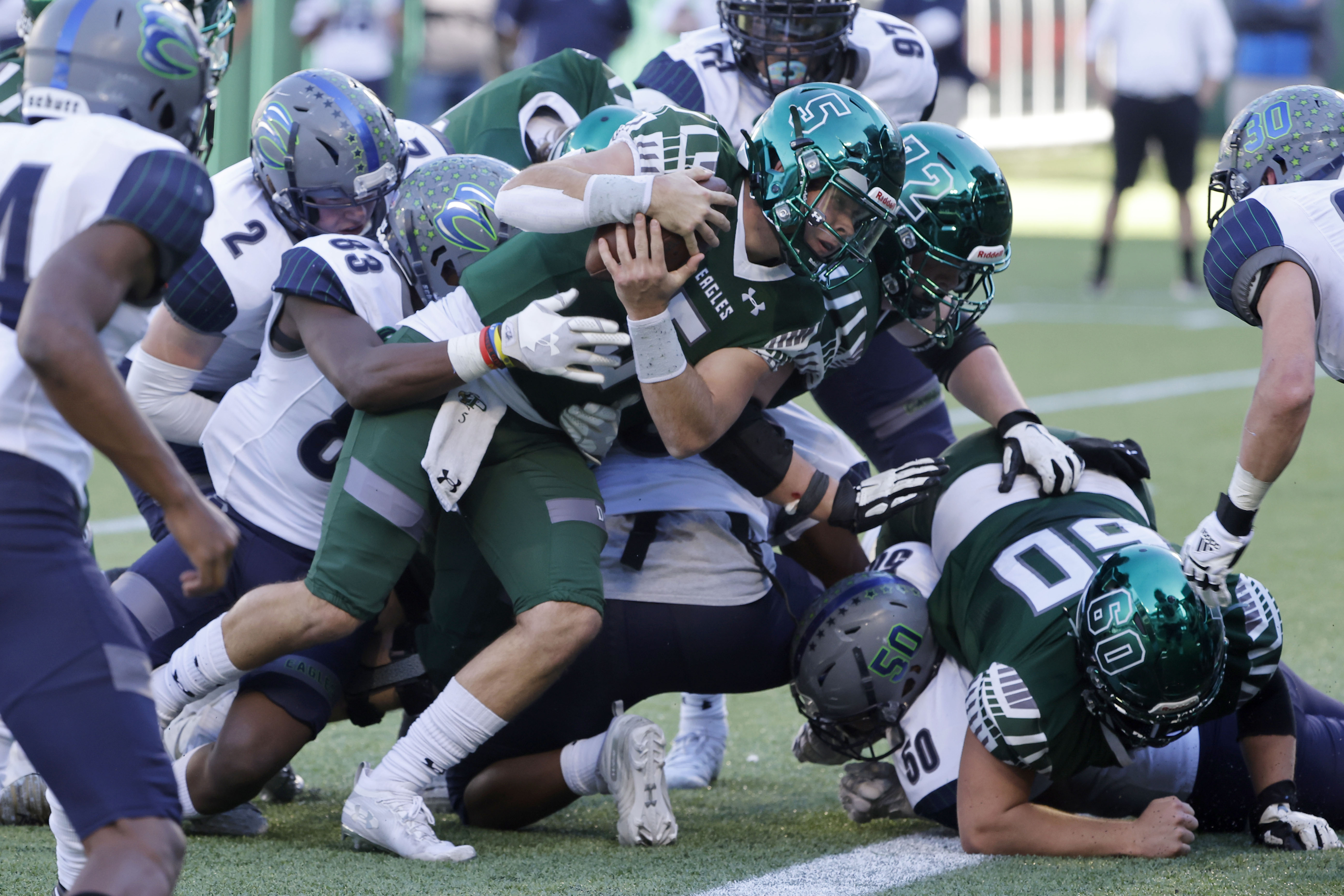 Prosper quarterback Jackson Berry (5) runs in for a touchdown against Northwest Eaton during...