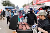 Agnes and George Fang prepare Taiwanese sausage during a Lunar New Year celebration on...