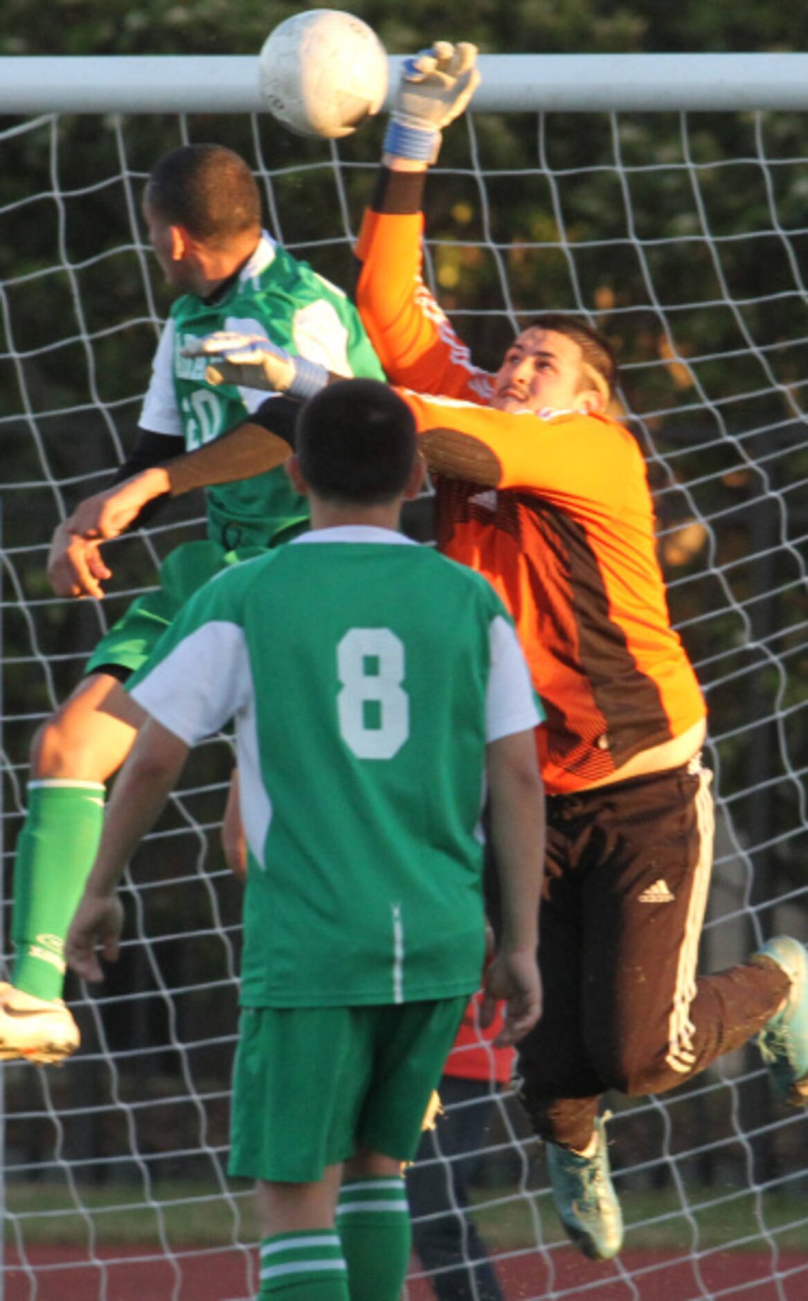 R.L. Turner goalie Juan Reballos (1) goes up to block a flying attempt at a score by Bryan...