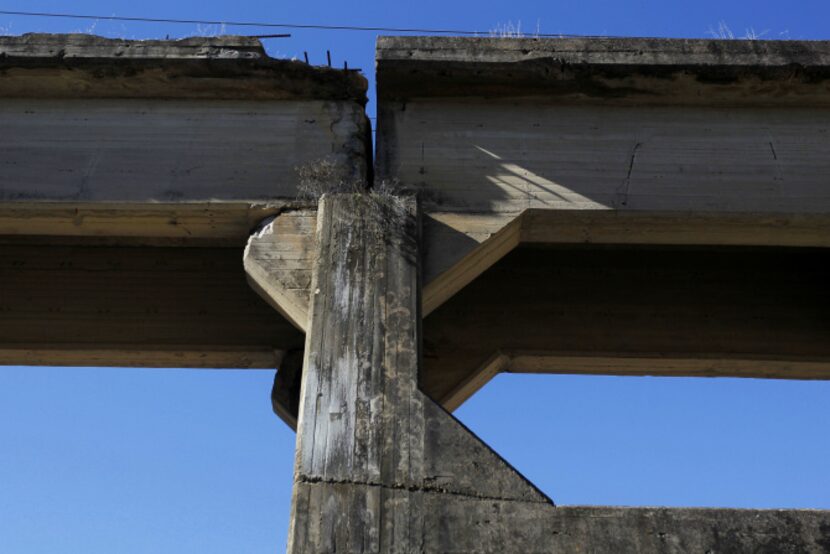 Oncor hasn’t yet developed a plan for the demolition of the bridge, said Megan Wright, a...