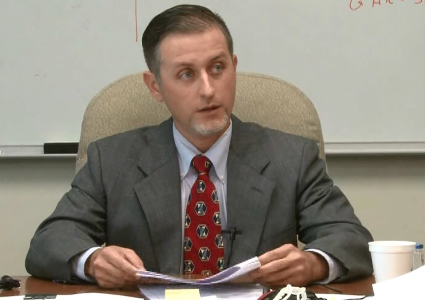 Texas Department of Public Safety forensic scientist Chris Youngkin testifies in a...