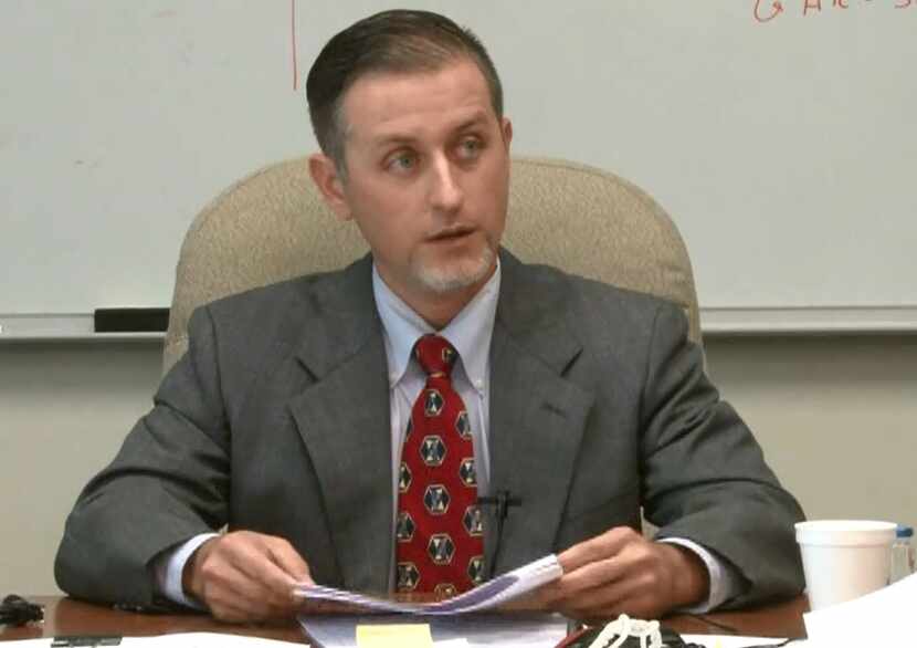 Texas Department of Public Safety forensic scientist Chris Youngkin testifies in a...