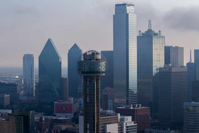 Reunion Tower and downtown Dallas, including the Bank of America Tower (center right) and...