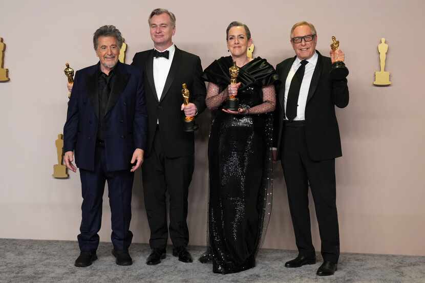 Al Pacino, from left, Christopher Nolan, winner of the awards for best director and best...