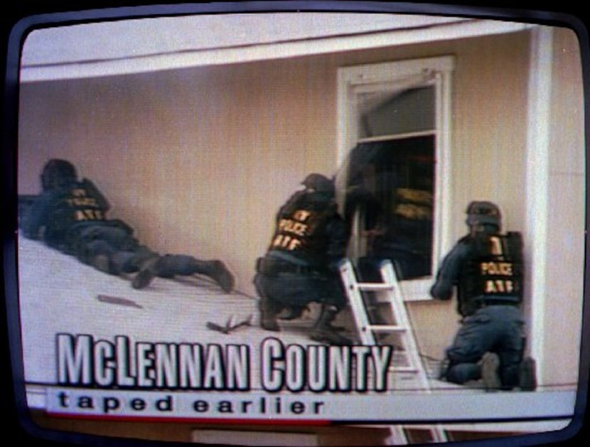 Bill Buford and his ATF teammates attempt to enter the compound's weapons storage room on...