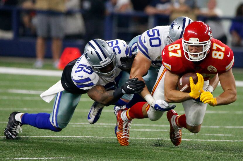 Dallas Cowboys' Anthony Hitchens (59) and Sean Lee (50) combine to stop Kansas City Chiefs'...