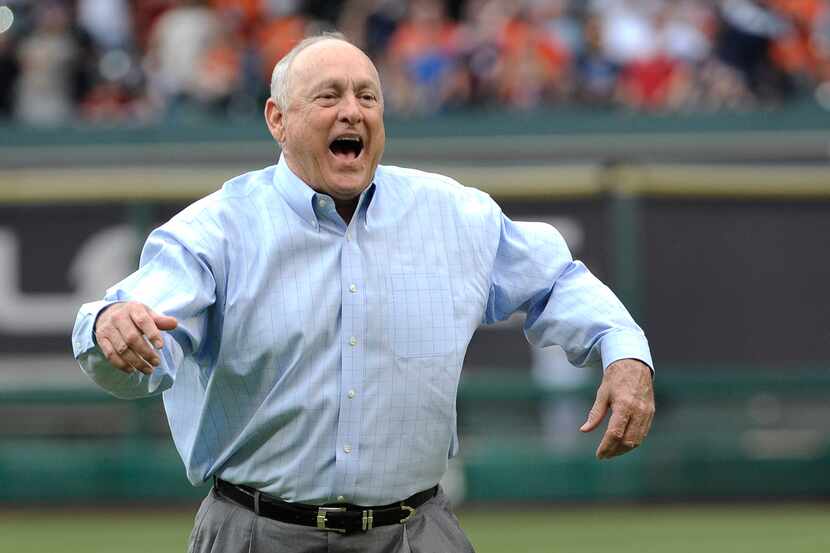 Hall-of-Fame pitcher and former Houston Astro Nolan Ryan reacts to a wild pitch after...