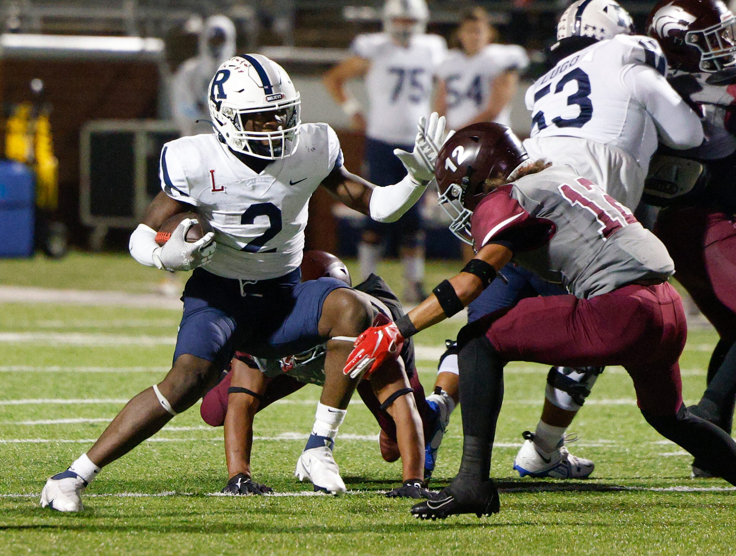 Mansfield Timberview safety Kourtland Jordan (12) tackles Richland running back Michael...