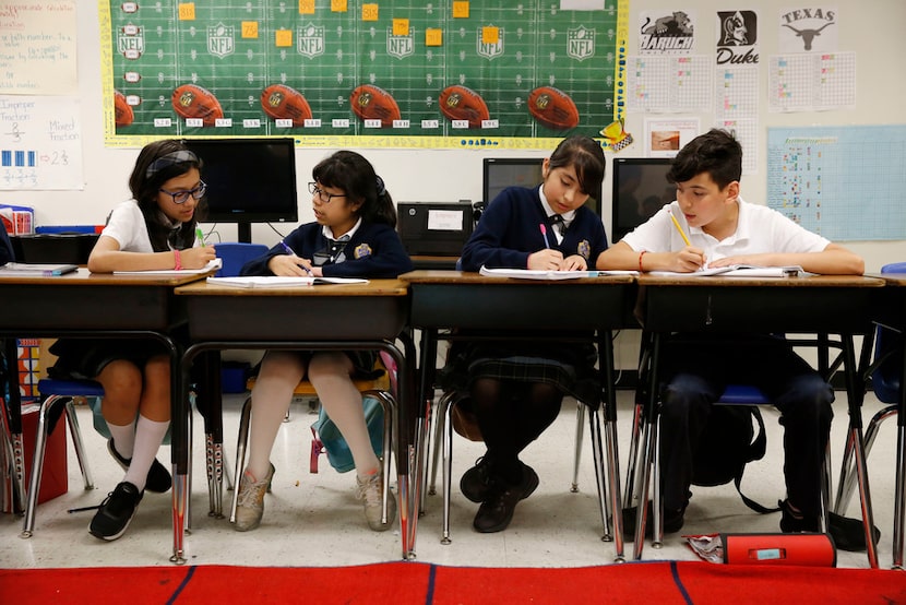 From left: Daniela Hernandez, Beatriz Ramirez, Briana Morales and Juan Pablo Ortiz work on...