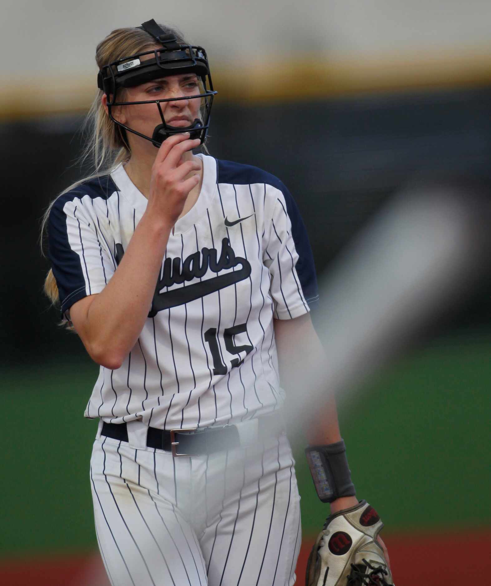 Flower Mound pitcher Landrie Harris (15) reacts after delivering a pitch to a Deer Park...