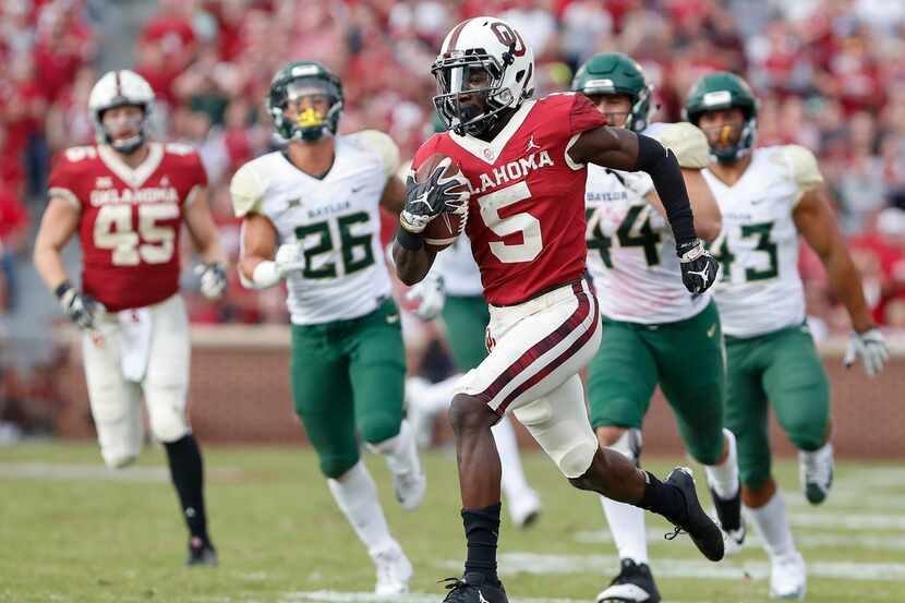 FILE - In this Sept. 29, 2018, file photo, Oklahoma wide receiver Marquise Brown (5) runs...