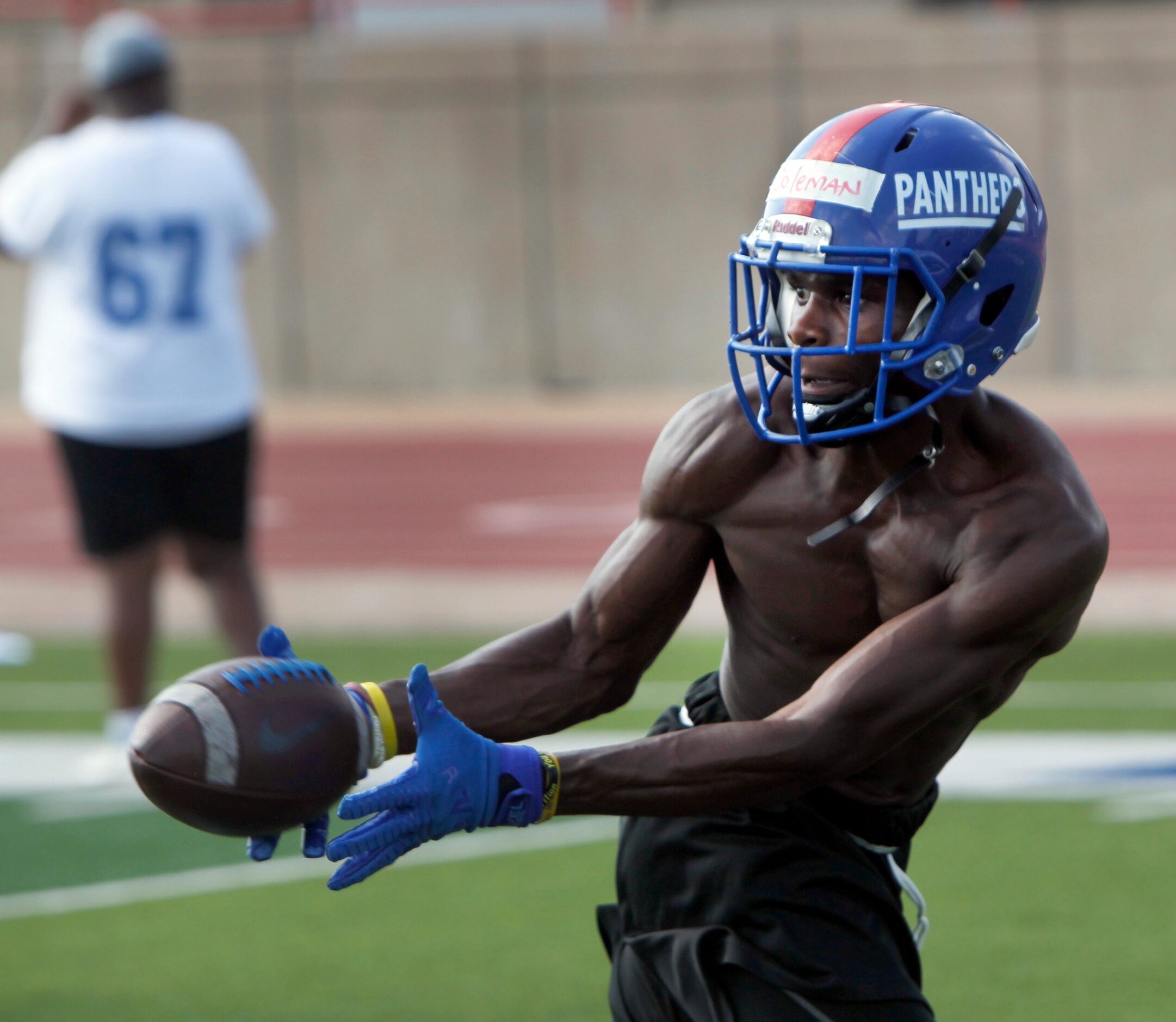 Duncanville Panthers' Damyrion Coleman shows fine focus as he pulls in a pass out of the...